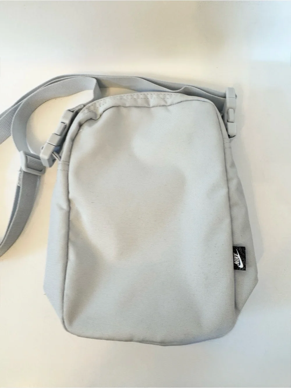 Nike Small Light Blue Crossbody Bag with Purple Logo